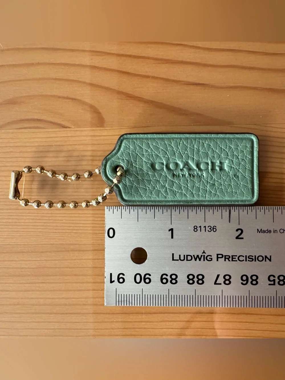 Coach Sage Green Pebbled Leather Leather Hang Tag